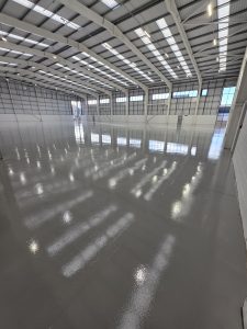 Commercial resin flooring in warehouse and industrial environments