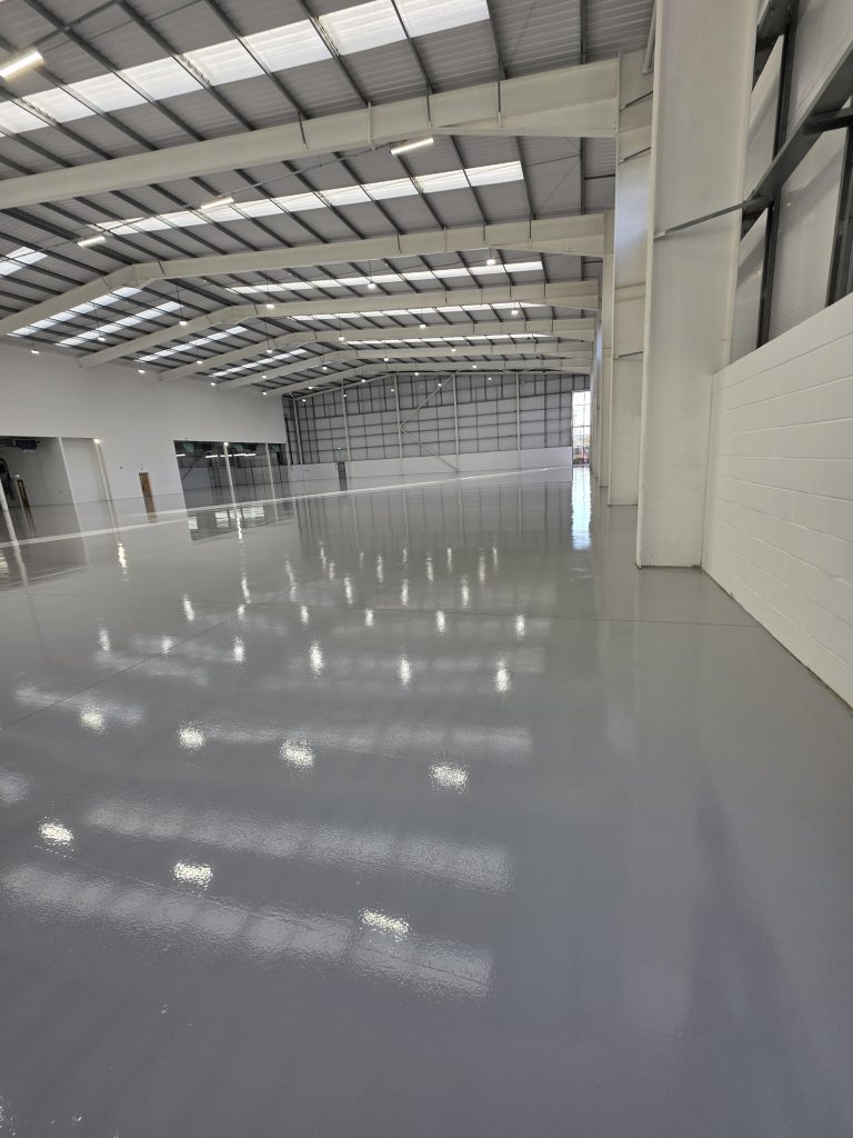 High-performance epoxy flooring installed in a commercial unit