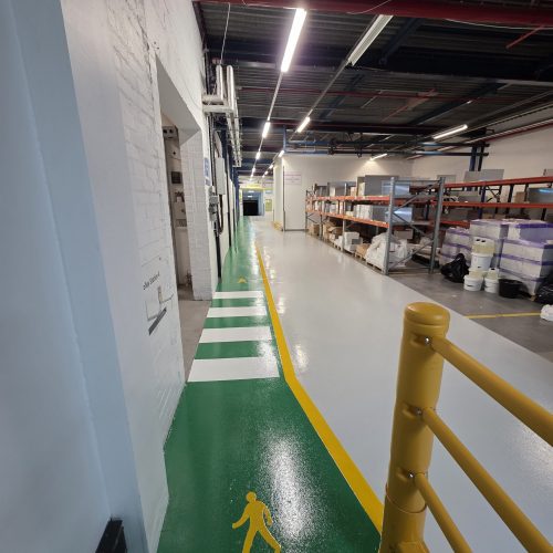 inbound8167493451702957494 Industrial warehouse floor line marking for pedestrian walkways and forklift routes
