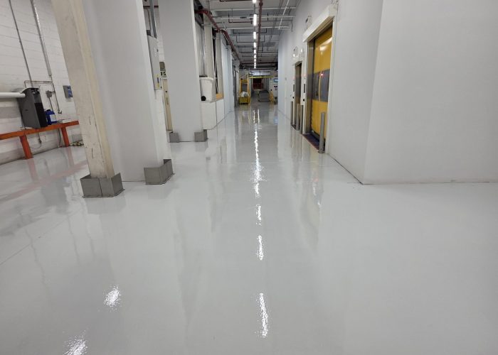 epoxy flooring south wales warehouse Warehouse flooring and epoxy floor coating in a South Wales industrial unit