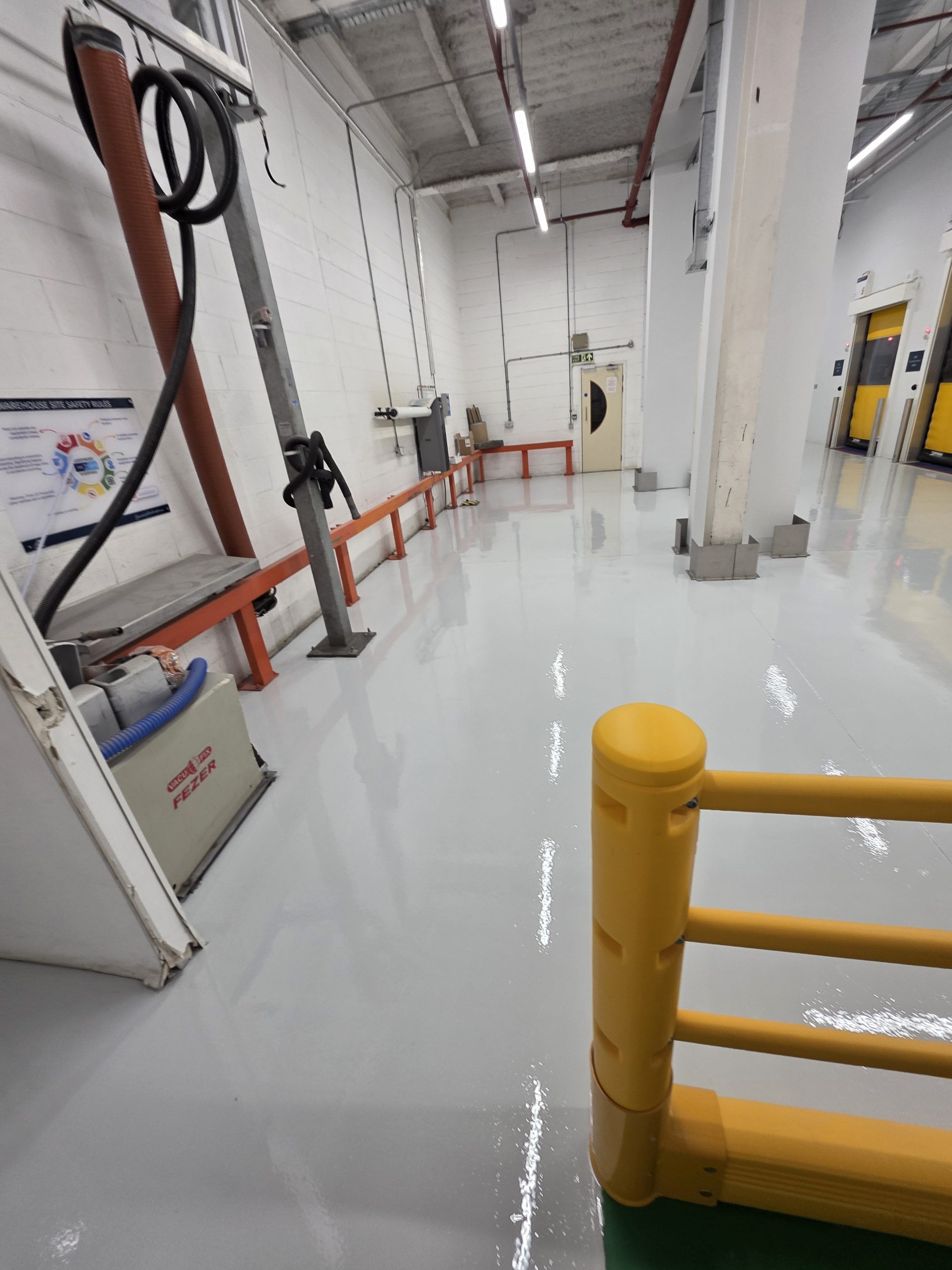 Industrial floor coatings installed in a commercial warehouse