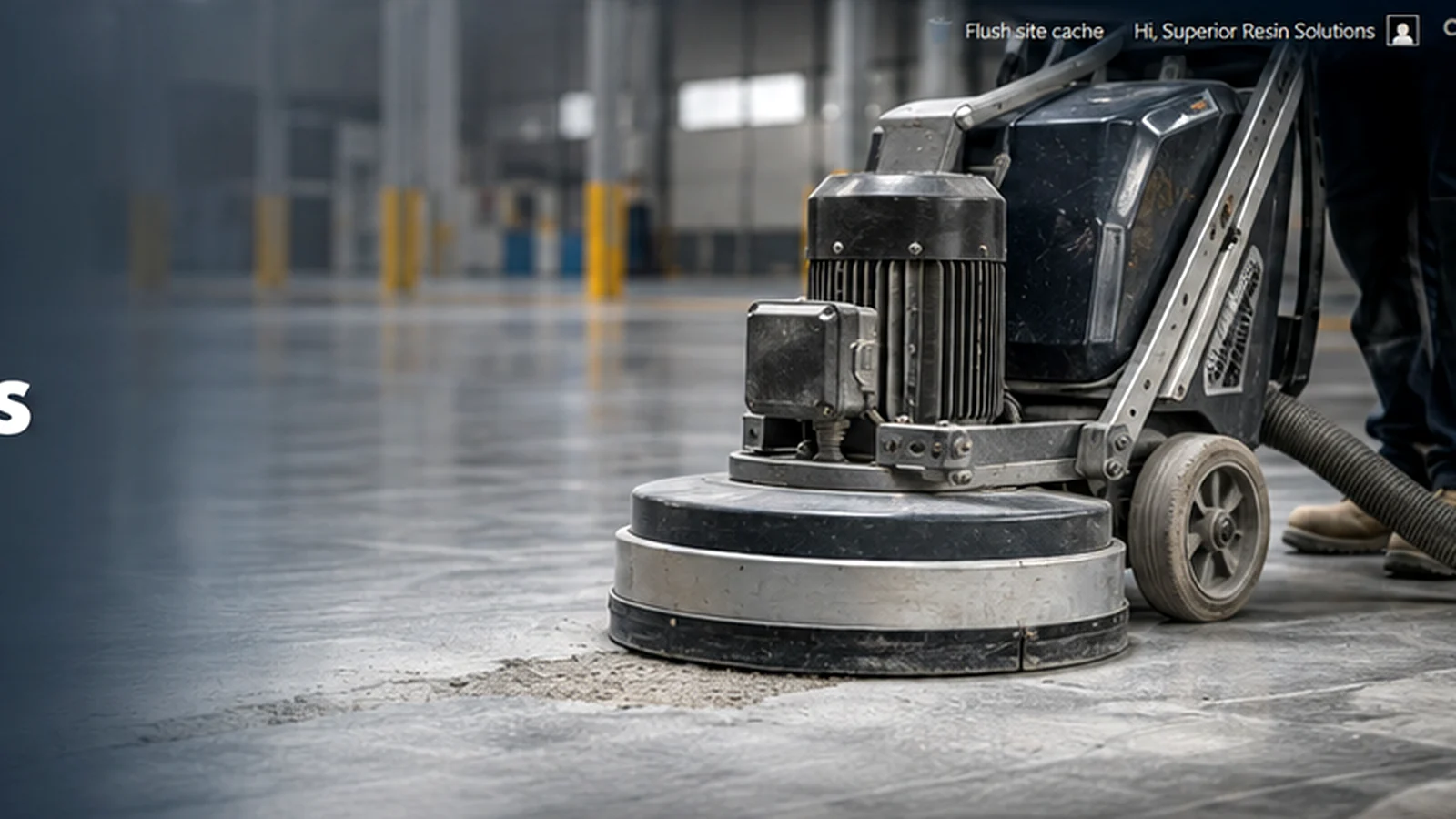 Industrial floor preparation using a diamond grinder on a concrete factory floor
