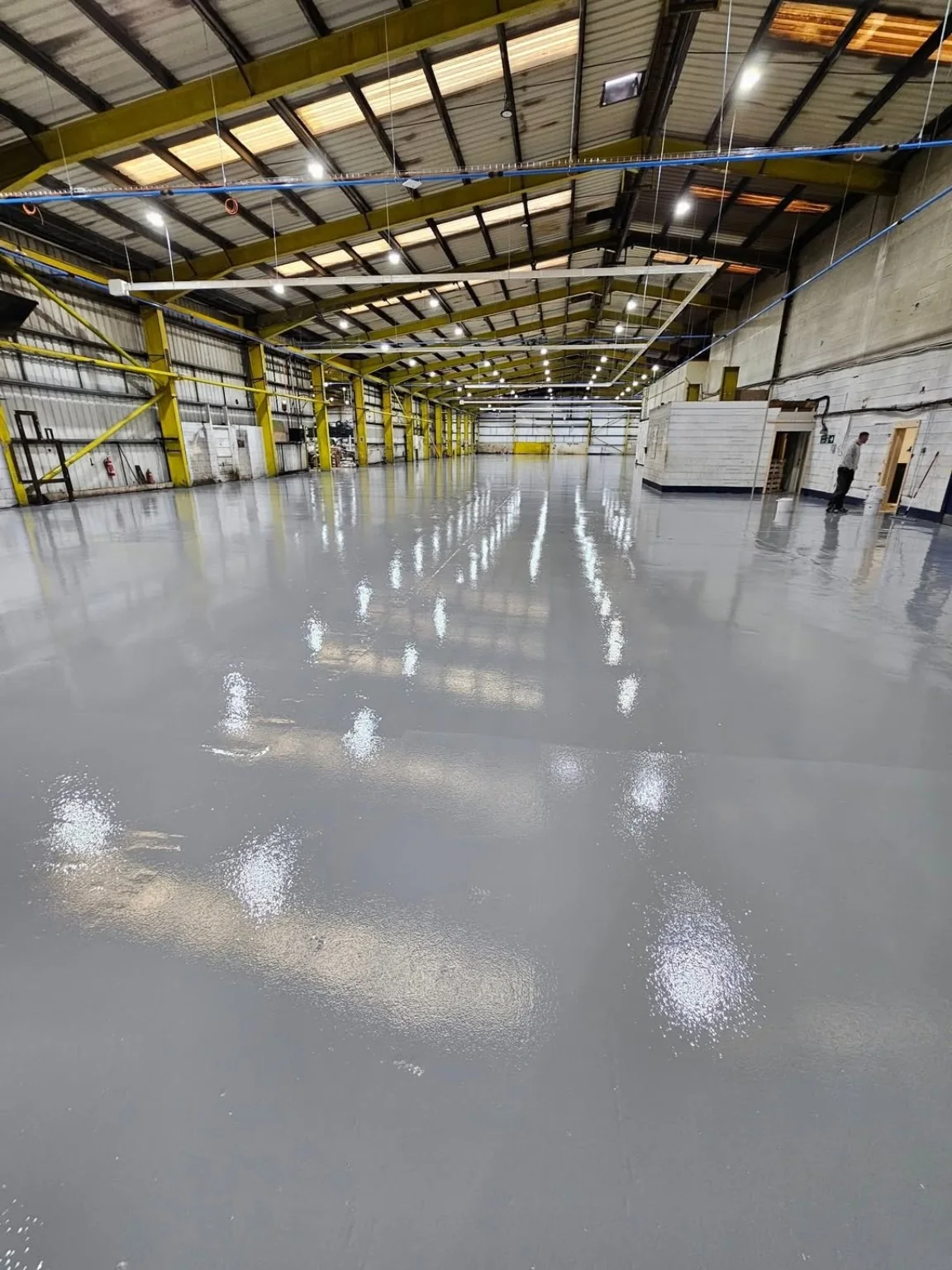 Completed light grey epoxy warehouse resin flooring in Rhondda South Wales