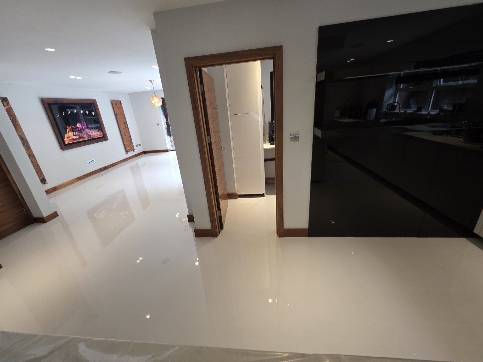 Arturo Comfort Floor seamless domestic resin flooring in an open-plan home