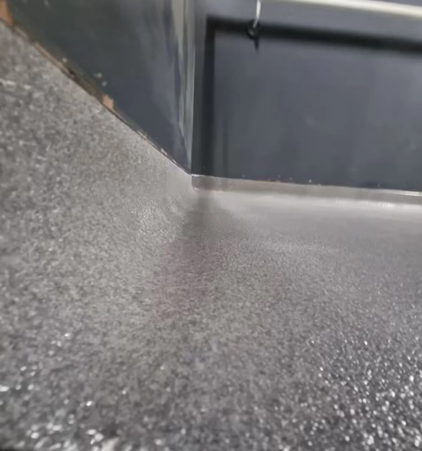 Anti-slip resin flooring with coved edge detail at Village Hotel Bristol
