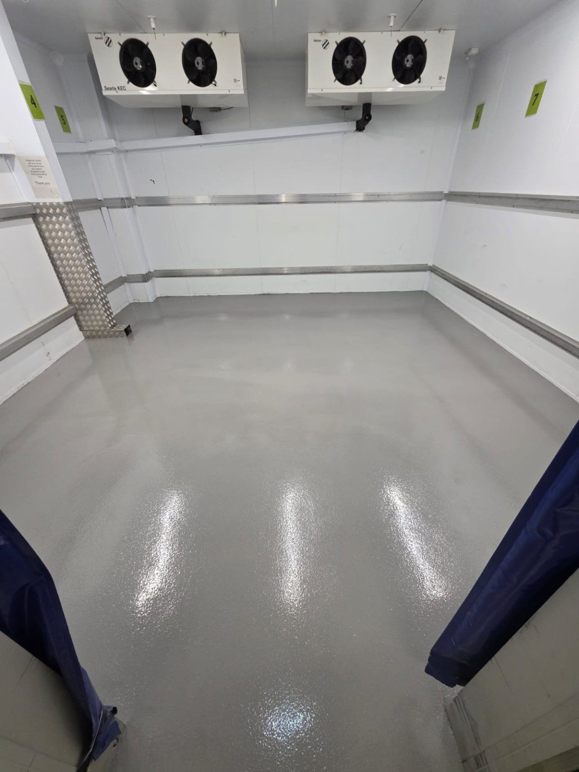 Grey resin flooring installed in Waitrose freezer in Portishead